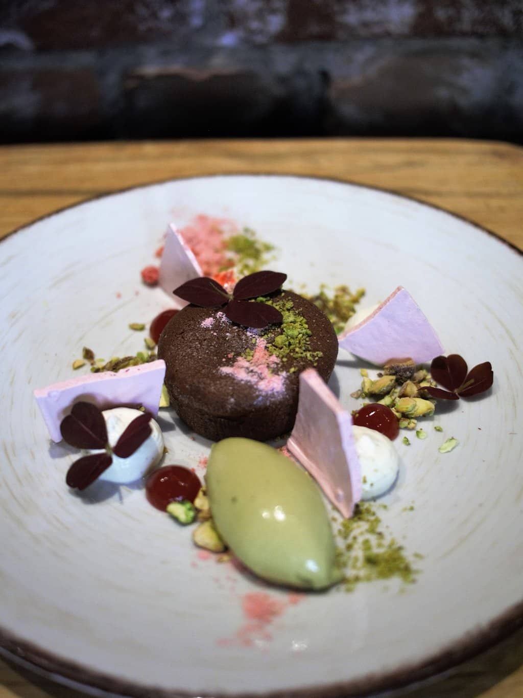Chocolate fondant with cream cheese and pistachio ice cream