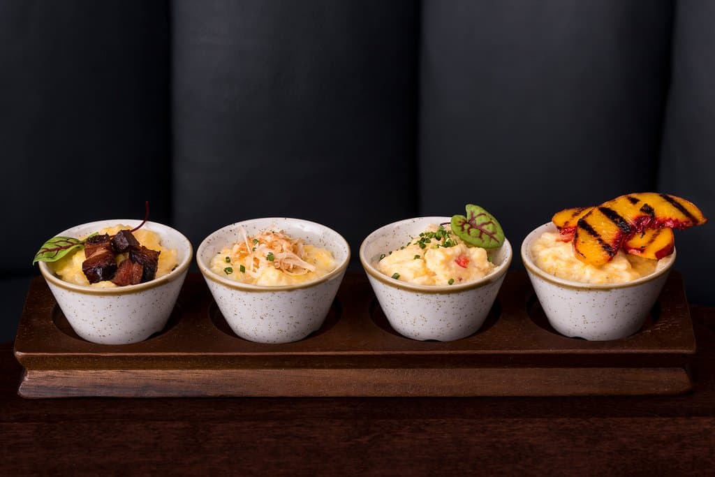 Our popular "Grit Flight" is a must while joining us! A fun dish the whole table can enjoy toget