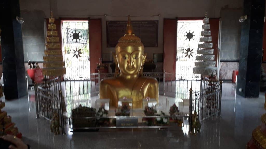 The Half-Buried Buddha