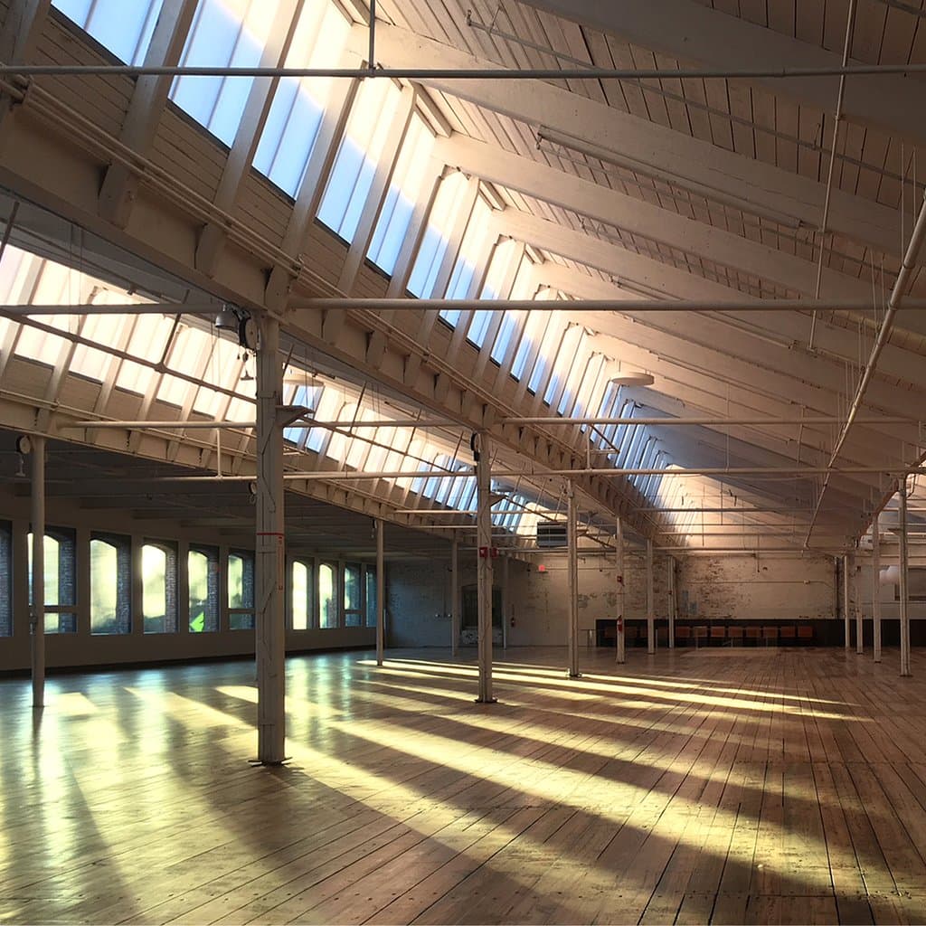 Summer solstice sunrise in Greylock Works Event space. simply breathtaking.