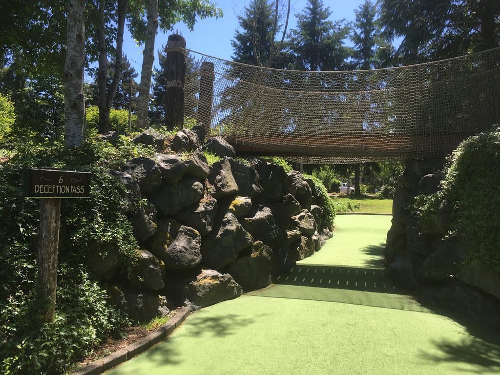 This hole you walk under a cute little bridge