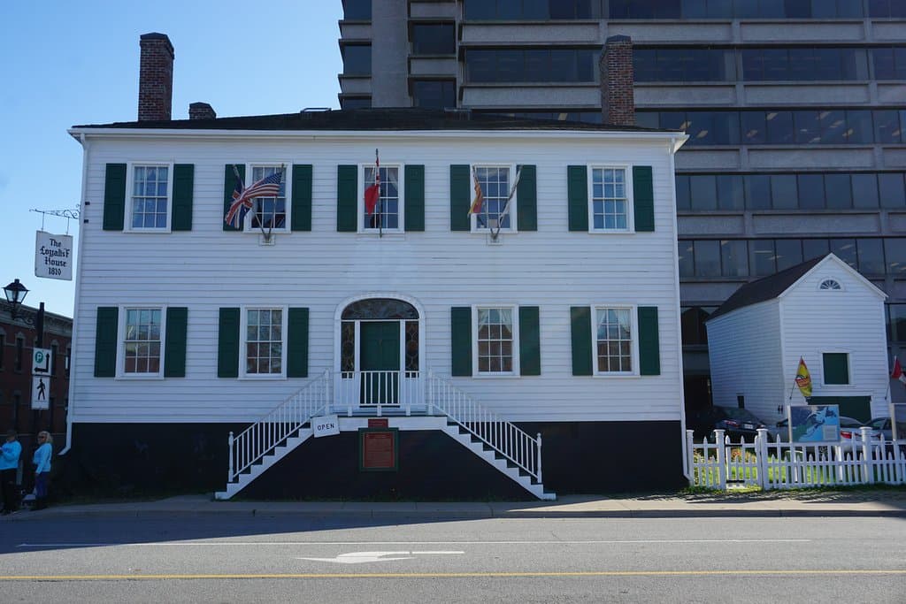The view of the home, looking across Union Street. When built the front door was at ground level. The carriage house is to the right.