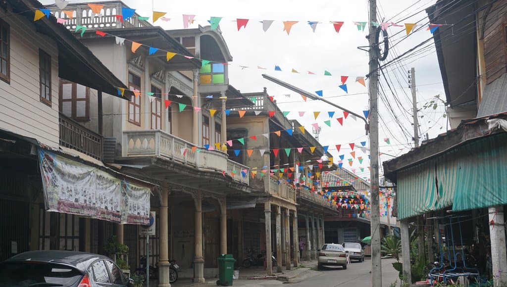 Street with old buildings in Tha Muang
