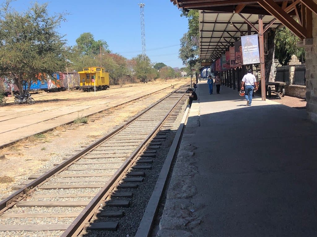View along the station showing some of the dilapidated rolling stock.