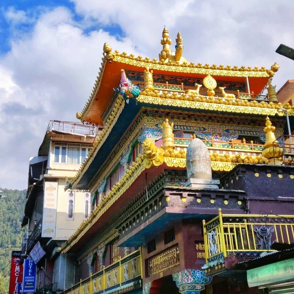 The Kalachakra temple is located inside the Thekchen Chöling temple complex in Mcleodganj in the hill state of Himachal Pradesh in India. The temple complex also houses the Namgyal monastery, the private chambers of his Holiness the Dalai Lama and the famous Tsuglakhang temple. Opened in the year 1992, the Kalachakra temple is a symbol of the concept in Buddhist religion known popularly as ‘The wheel of time’. Kalachakra is a combination of two Sanskrit words Kāla (meaning: time) and Chakra (me