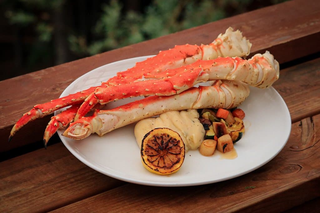 The highlight of our menu features a full pound and a half of premium Alaskan Red King Crab served with clarified butter, mashed potatoes, seasonal vegetables, and grilled lemon. We're open everyday from 5PM-11PM.