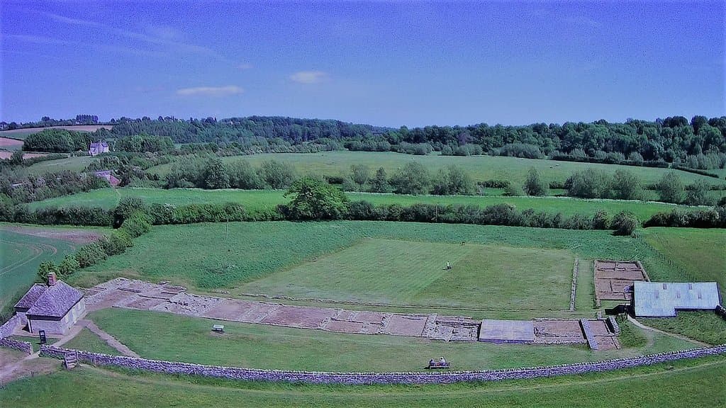 Villa. on field by it. no flying over