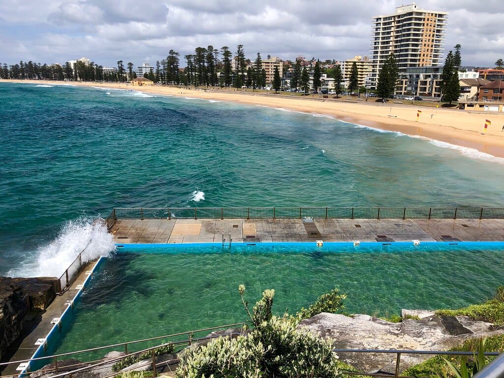 Looking down over Queenscliff surf beach and tidal swimming pool