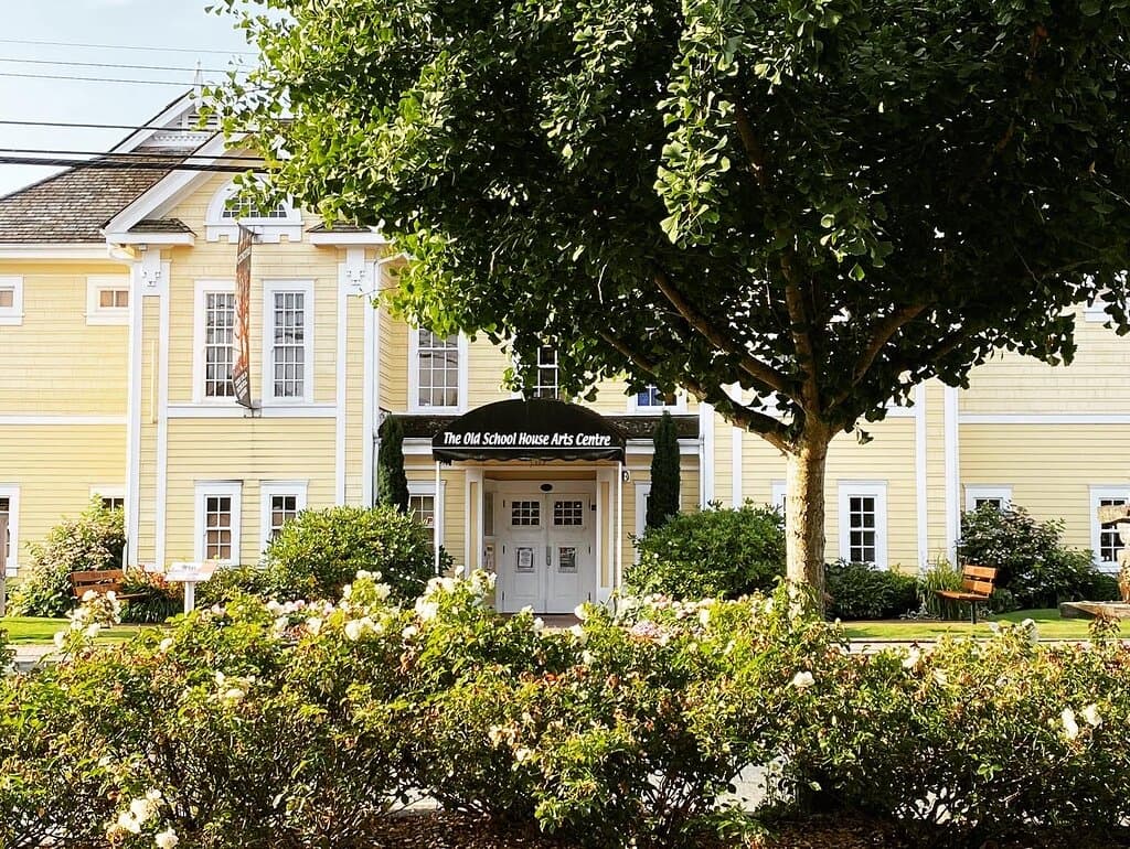 The bright yellow heritage building with a big history nestled in the centre of Qualicum Beach, The Old School House Arts Centre houses ten shared Resident artists studios and is an established public art gallery and art learning centre.