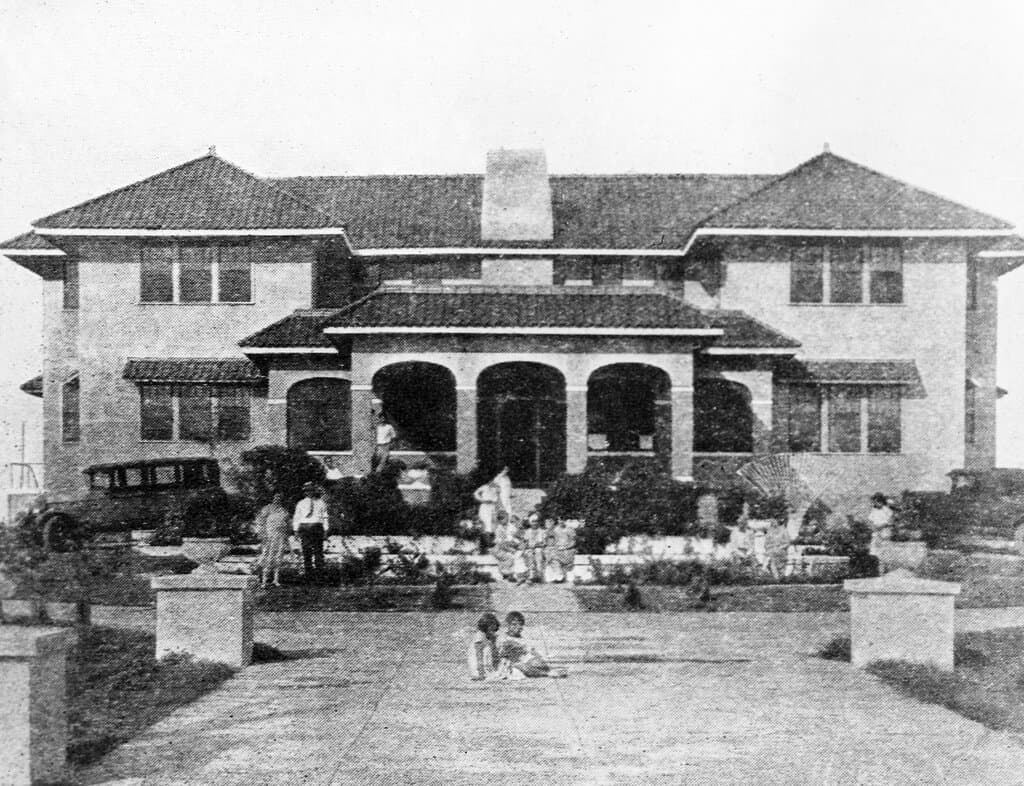 Fuquay house with family around the swimming pool