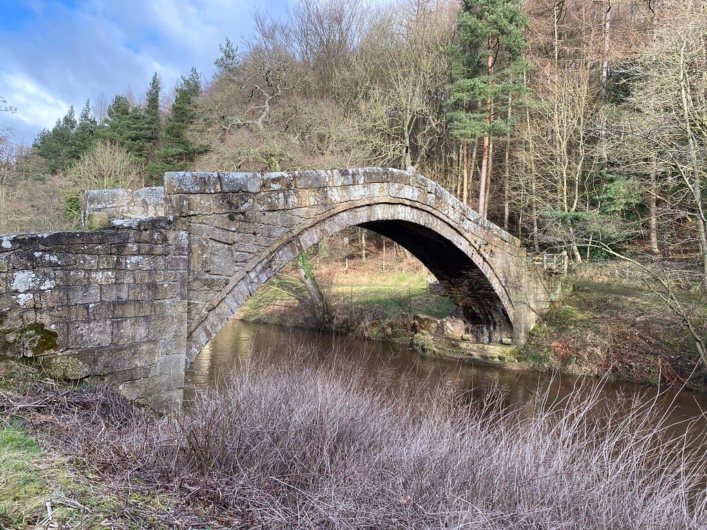 Grade II* listed packhorse bridge over the River Esk from the 17th Century.