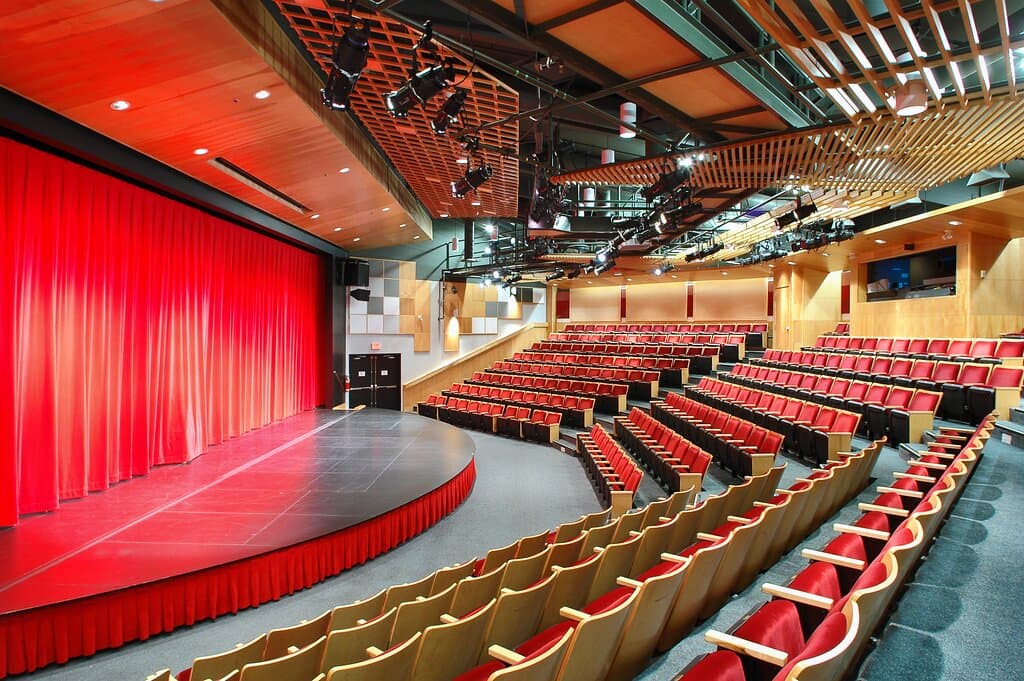 The theatre's seating has 3 sections, 8 rows and 310 plush velvet chairs all with unobstructed views, including 4 wheelchair accessible spaces in the front row. Climate controlled heating and cooling and a private reception lobby allow for the most comfortable experience possible. Those who have attended the Charlie White Theater will attest to its quality, luxury, and diversity in programming.