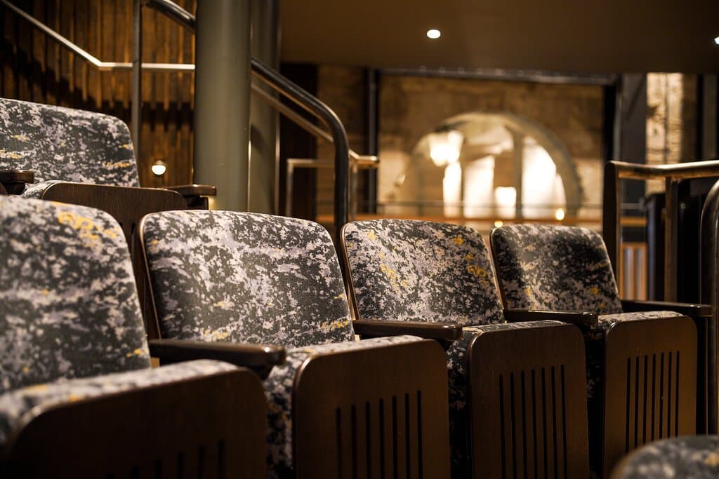 Seating in the Cornwall Playhouse. Designed to replicate Cornish granite.
Photography by Hugh Hastings.