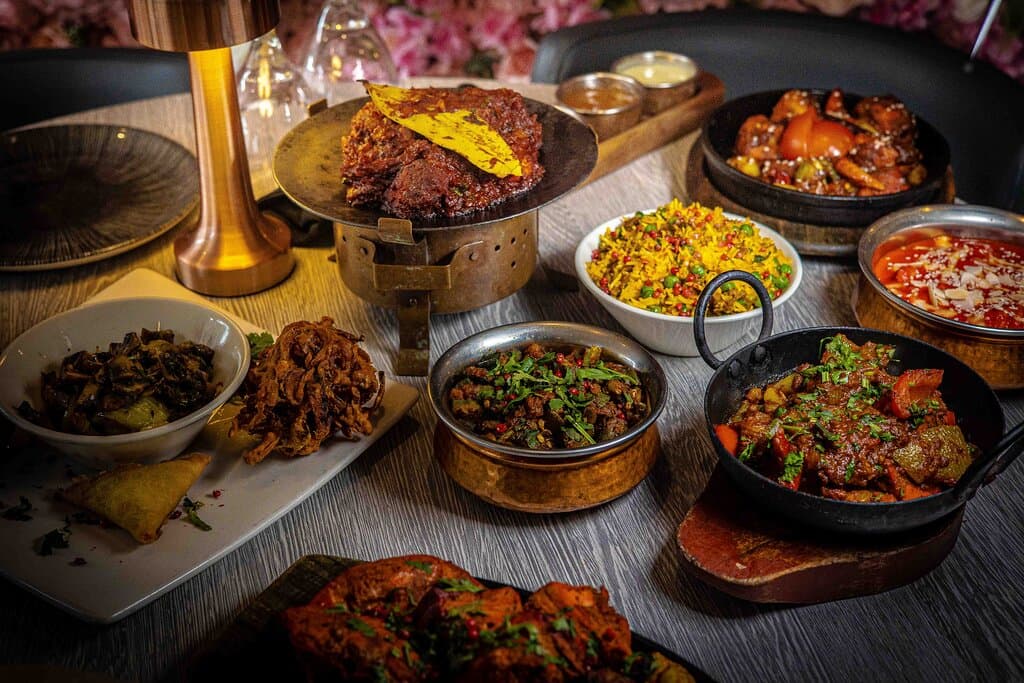 Delicious Rivaaz specials. Unique recipe curries you will not find anywhere else! Mixed platter, garlic mushrooms, chicken tava, jalfrezi, masala, special fried rice, tandoori sizzler.