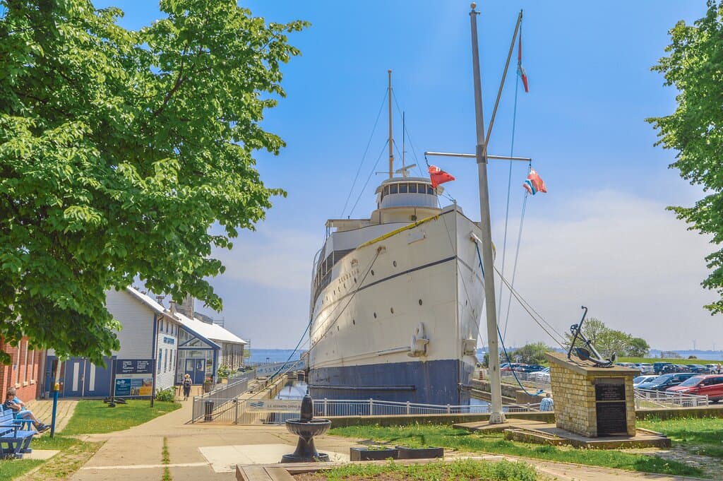 A view from the street of the museum entrance and the S.S. Keewatin