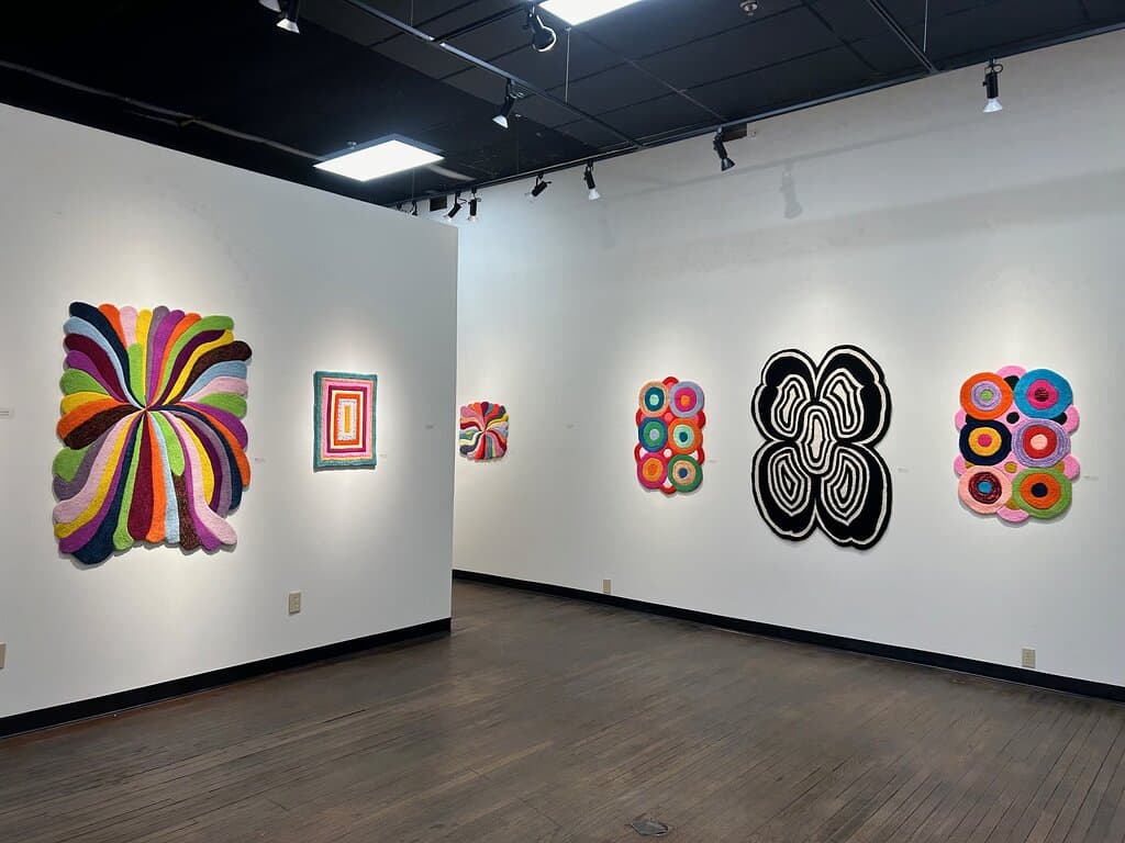 "Burst" an exhibition of hand-tufted works of art by Rachel Comminos